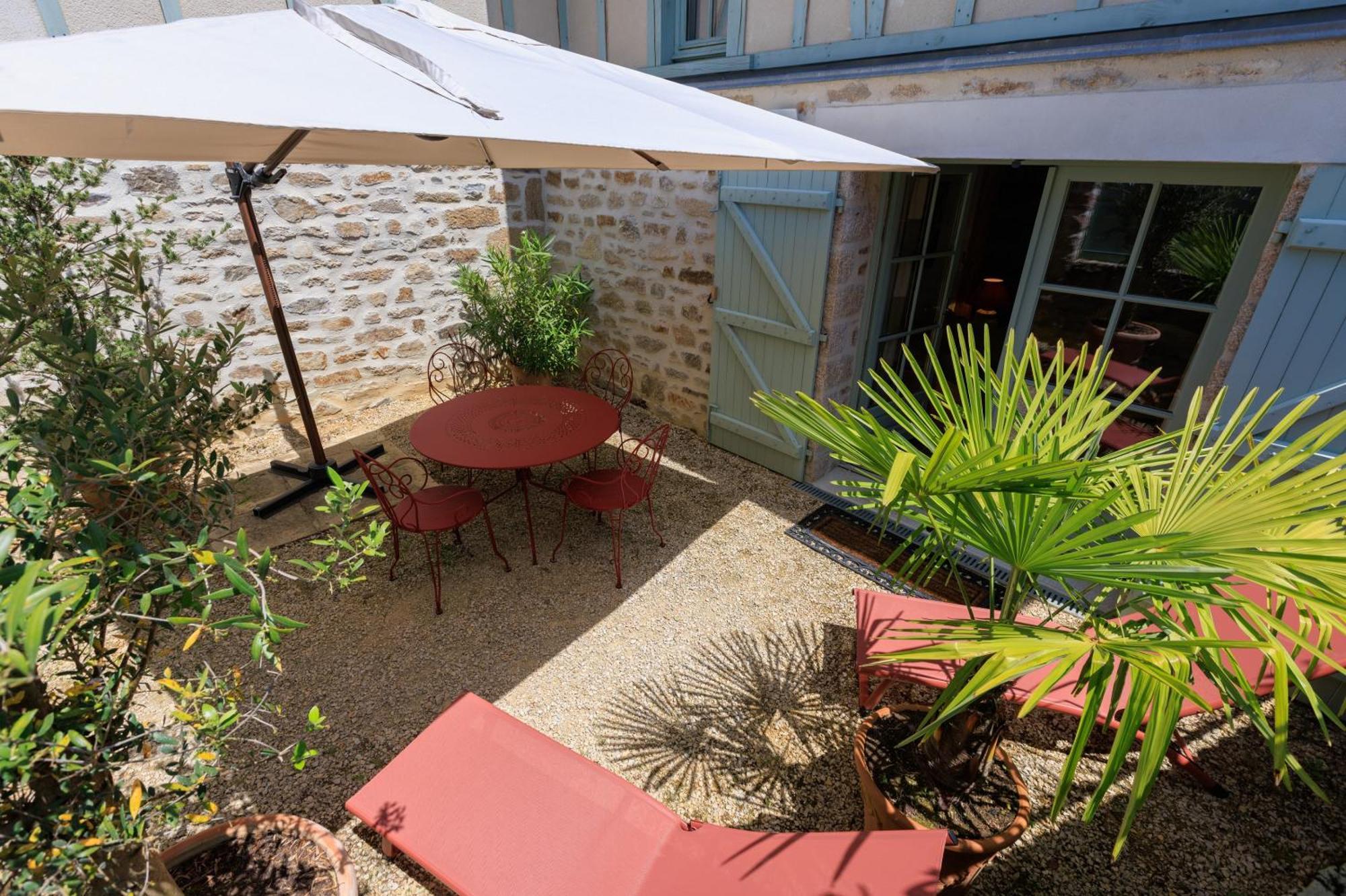 Maison D'Hotes Les Jardins Saint Eloi Le Lonzac Exterior photo